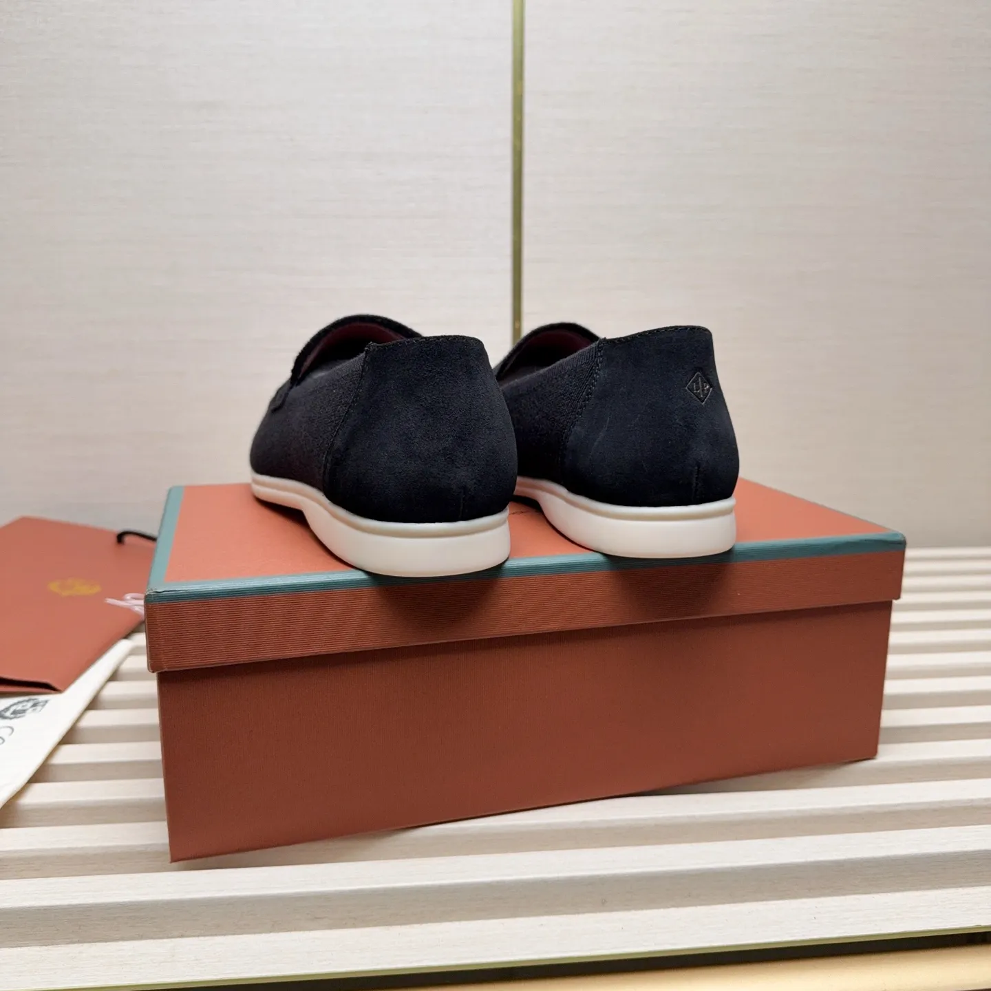 Men's Men's Shoes 💰400 Loro PIana moccasins are made of wish wool fabric. The upper is made of knitted fabric, made on a loom, and then attached to a rubber sole. The Rain System's water-repellent treatment enhances the shoe's functional design, while the suede details give the shoe a sense of elegance and sophistication. Made from Wish, fine wool from Australian and New Zealand Merino sheep